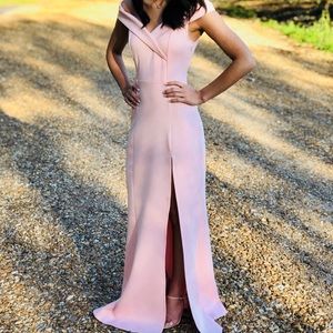 Pink off the shoulder prom dress.